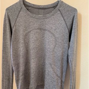 Lululemon size 8 women’s grey swiftly tech long sleeve top.